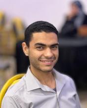 Young man smiling at camera